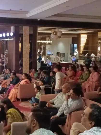 A view of the guests enjoying the show at a baby shower at the Royal Atlantis Banquet. It's not always about dancing, sometimes it's about creating a pleasant atmosphere.