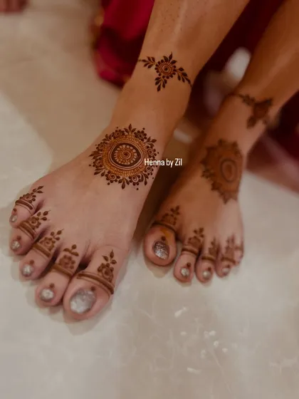 A simple and beautiful mandala design for the feet, perfect for a bride who wants an elegant, minimal look.