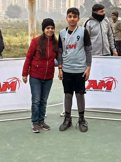 A player receiving their medal at the Winter League Championship. We recognize individual effort and contribution.