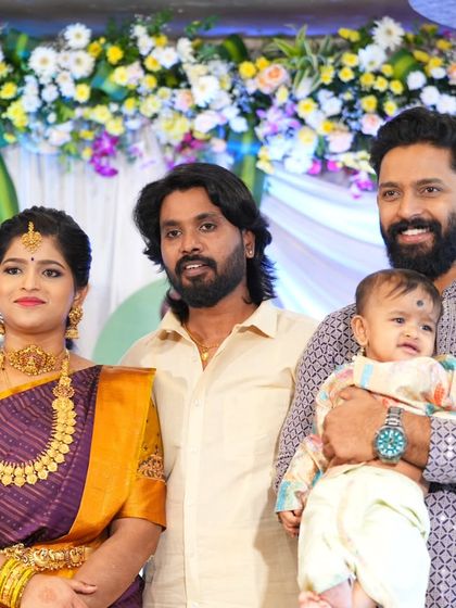 Celebrating with family, our client shines in her rented temple jewellery. Renting allows you to wear grand jewellery for every special occasion without the high cost.