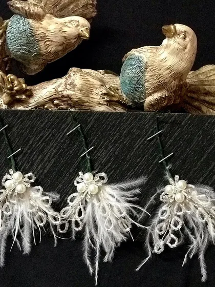 The white version of my fluttery feather pin set is perfect for a classic bridal look or for bridesmaids.