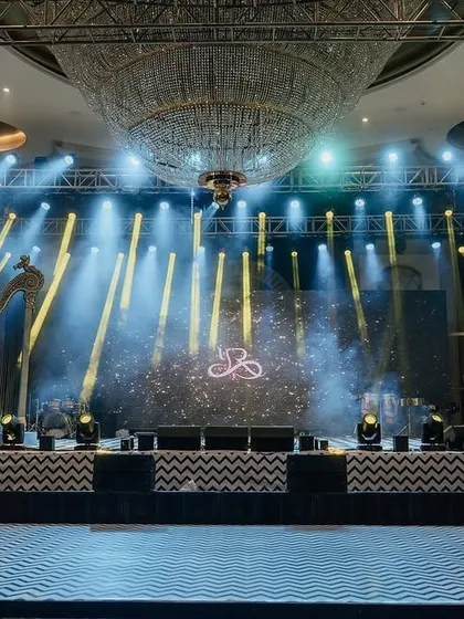 The grand stage for Yasha and Rahil's Sangeet at Radisson Blu, Karjat. The setup featured a massive LED screen, professional lighting, and a custom-printed dance floor for a full concert-level experience.
