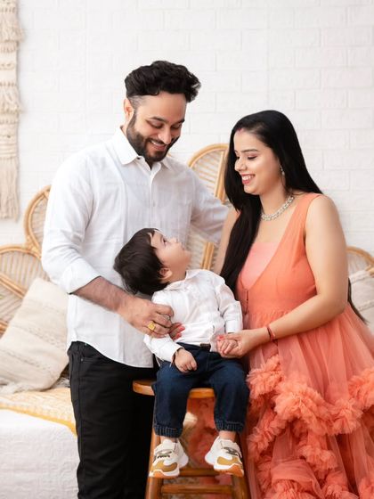 The way a family looks at each other tells a story. I focus on capturing these loving glances that speak volumes about your bond.