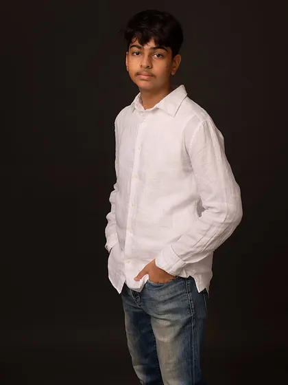 A confident standing pose. These classic portraits are perfect for marking the transition from childhood to the teen years.