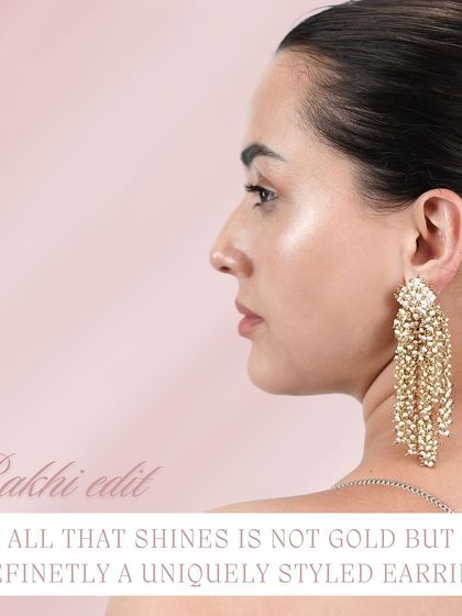 All that shines is a uniquely styled earring. This gold-toned pair is perfect for making your festive look special.