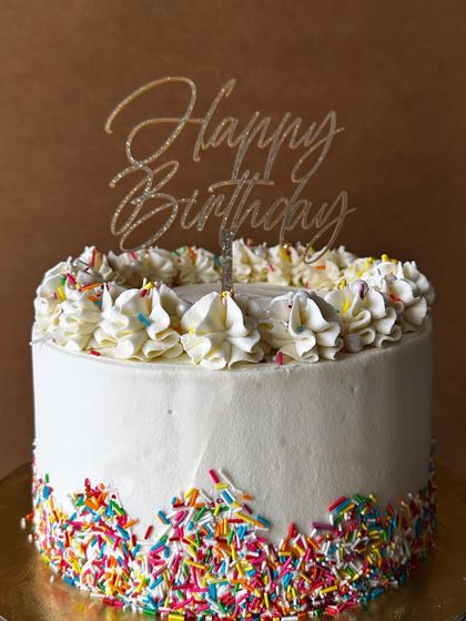 For someone who takes their sugar intake seriously. This cake has sugar confetti sponges, whipped Belgian chocolate ganache, and is covered in more sprinkles. It's a true sugar rush.