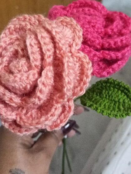 Two lovely crochet roses, one in a soft peach and the other in a vibrant magenta. I can create these in any color you like to match your decor or create a custom floral gift.