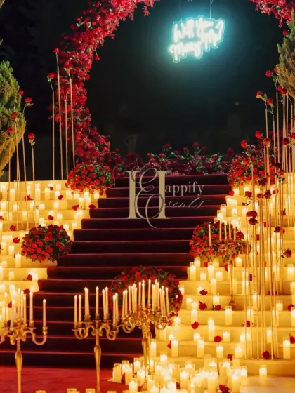 This grand proposal in Karjat is what dreams are made of. I used hundreds of candles, a lush red rose arch, and a custom neon sign to create an overwhelmingly romantic atmosphere for a truly unforgettable moment.