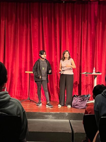 A student volunteer gets her moment in the spotlight at Lincoln School. This act is always a hit with teenagers.