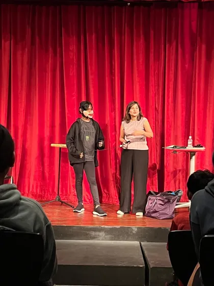 A student volunteer gets her moment in the spotlight at Lincoln School. This act is always a hit with teenagers.