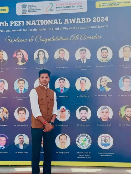 Standing in front of the wall of awardees at the PEFI National Awards. This recognition fuels my passion to continue working at the grassroots level to develop talent.