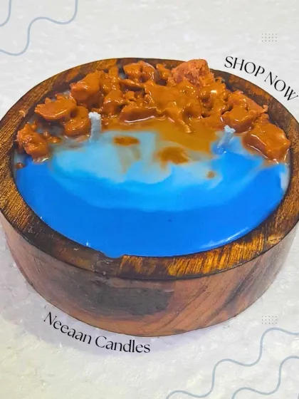 A candle that brings the beach to your space. This hand-poured piece in a wooden bowl is a little escape.