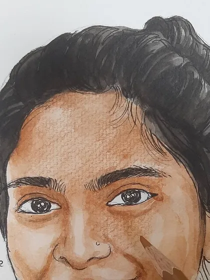 The coloring process begins, where we carefully layer watercolors and colored pencils to build up skin tones and shading.