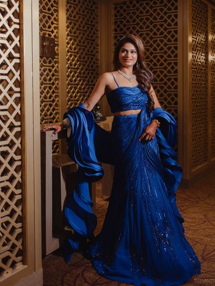 A beautiful portrait of the bride in her Sangeet gown, looking elegant and poised.