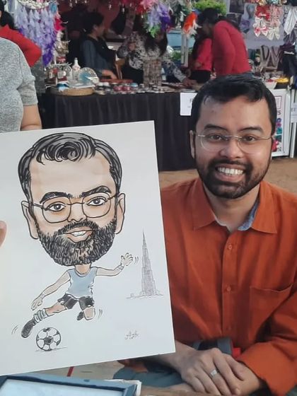 A soccer-themed caricature for a guest at the Dufa Marketplace event. It's a great way to combine a portrait with a passion.