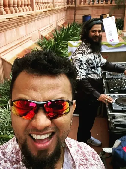 A great selfie with a fellow DJ during a daytime event. We're always having a good time while making the crowd dance.