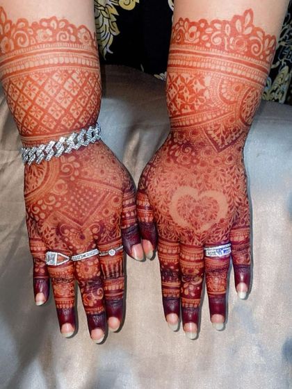 The full view of the personalized henna, showing the rich stain color.