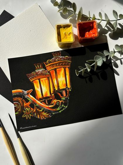 The full view of the lantern painting, a perfect example of how gouache can be used to create vibrant art on a dark surface.