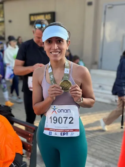 Our athlete Razien Patel with her finisher medal at the Athens Marathon. An incredible achievement to complete this iconic race.
