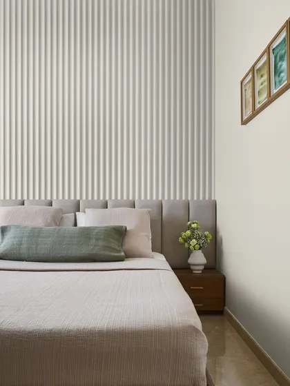 The Mirage Bedroom is a guest room designed with a Japandi-inspired calm. I used a fluted wall design behind the bed to add texture and depth, while the custom marble accent table provides a touch of natural elegance.