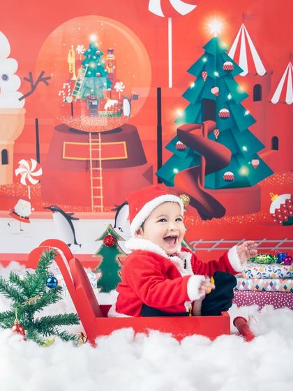 The pure joy of Christmas captured in one photo. This little Santa's laugh is infectious.