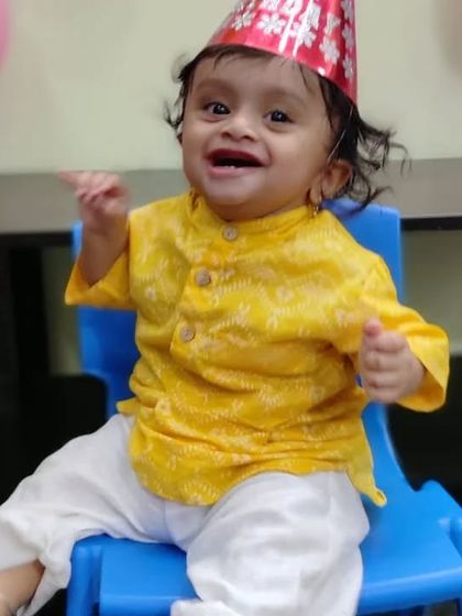 The pure joy on this little one's face is everything. He's wearing our Yellow Mellow Kurta, made from soft, breathable cotton that's perfect for a birthday celebration.