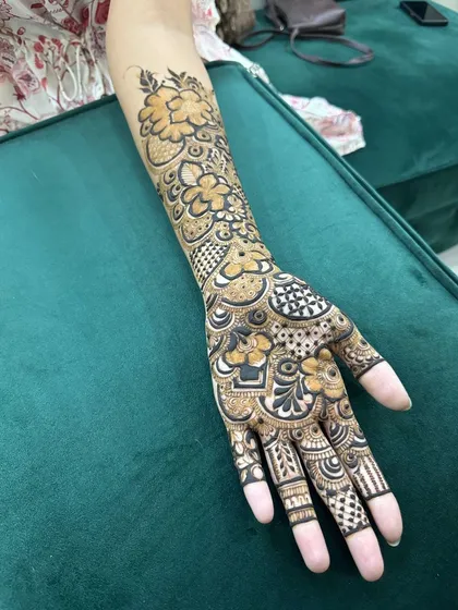 A full view of the arm, showing the beautiful flow of the design.