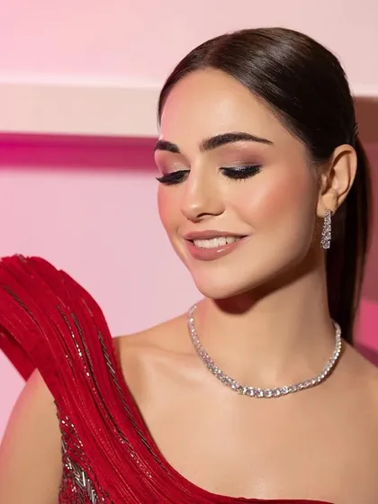 A smiling portrait. The styling is designed to feel joyful and confident, perfect for any special occasion.