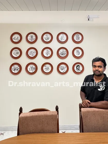 Here I am with a completed custom plate art installation. This project was a blast, telling a story across 15 individual hand-painted plates. It's a truly unique way to personalize a dining space and a great conversation starter for guests.