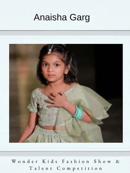 Welcome to the team, Anaisha Garg. Her graceful pose and lovely outfit show she is ready for the runway.