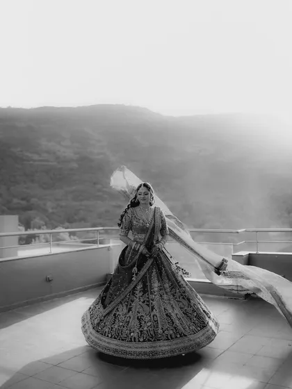 A bride against the vastness of the landscape. This black and white portrait showcases my fine-art style, using dramatic light and shadow to create a timeless, cinematic image that feels like a piece of art.