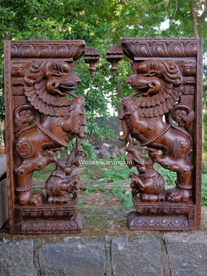 A pair of magnificent 36-inch Yaazhi brackets with a dark, waxy finish.