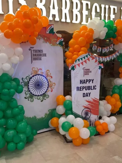 This is another shot of the large tricolor balloon arch for Themis Barbecue House, showing how it creates an impressive focal point for any corporate or commercial space.