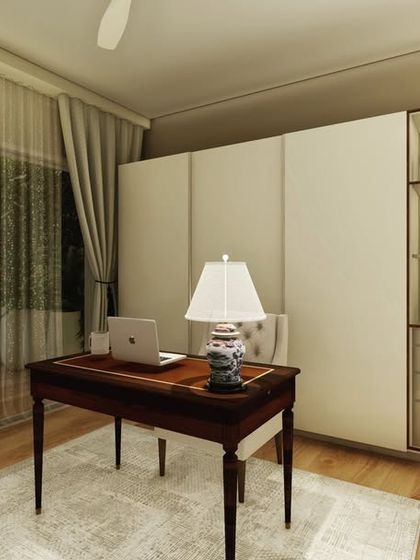 A serene home office setup with a classic wooden desk, a display cabinet, and a large window for natural light. This space is designed to be both functional for work and consistent with the home's elegant aesthetic.