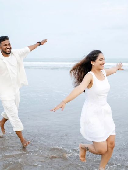 Carefree and joyful, running through the waves. I love capturing these moments of pure happiness during pre-wedding shoots.