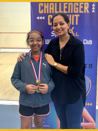 A memorable moment from the Challenger Circuit 2023, where a young medalist poses proudly with her award.