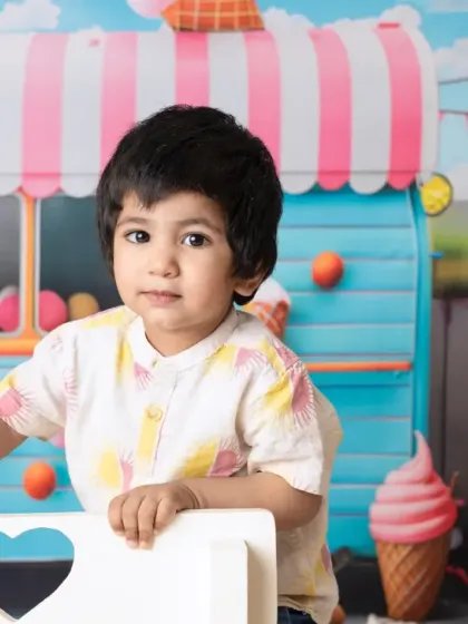 The ice cream truck theme is a hit with older kids too. These photos capture the pure happiness and excitement of a summer day treat.