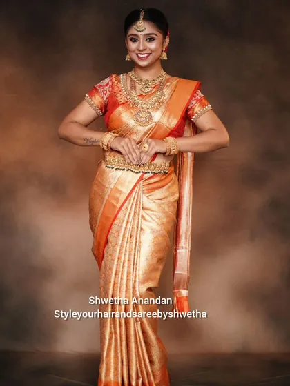 The final pose from our portfolio shoot. The model looks confident and beautiful, showcasing the skills our students learn in makeup, hair, and saree styling.