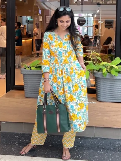 Another happy moment in my yellow floral kurta-pant set. It’s a festive, traditional, and modern look all at once.
