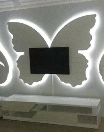 Your TV wall doesn't have to be boring. I designed and built this unique butterfly-shaped gypsum TV unit, complete with backlighting to make it a captivating piece of wall art that also serves a practical purpose.