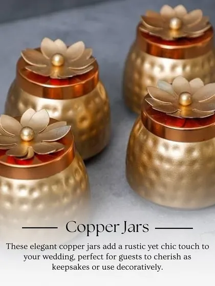 These elegant copper jars with floral lids add a rustic yet chic touch to your wedding. They are perfect for guests to use as decorative keepsakes long after the celebration.