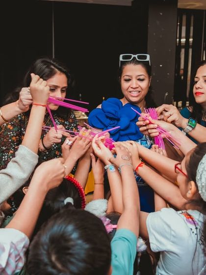 Pure, concentrated fun. Guests at this party are fully engaged in one of our interactive group games, working together and creating a memorable, shared experience.