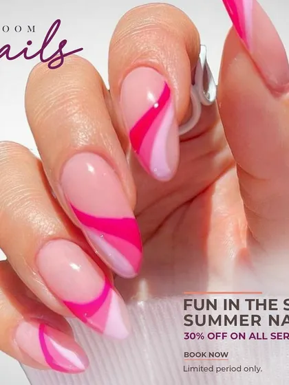 Get your summer nails ready. This design features abstract waves in shades of pink on a nude base.