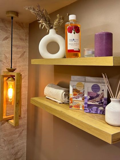 It's all in the details. We use high-quality products and create a soothing ambiance in every corner of our studio, including our pedicure area.