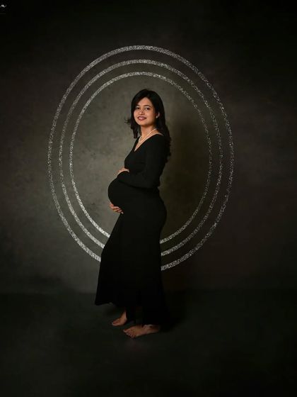 Another variation with digital background elements, showing how we can customize your portraits to add a unique artistic touch.