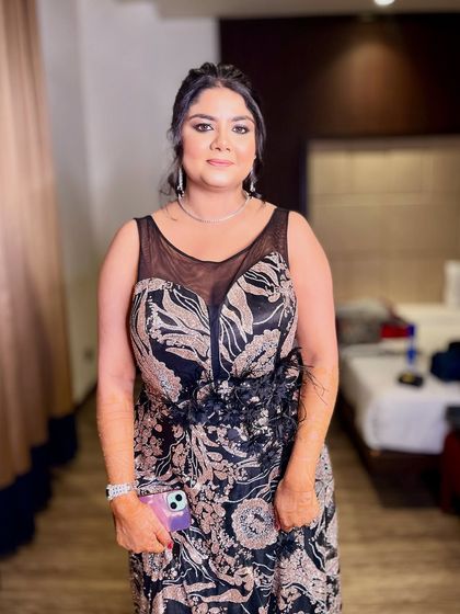 The full look, ready for the party. The makeup is designed to be both glamorous and comfortable, lasting through a night of dancing.