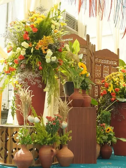 A corner filled with florals at our 'Moroccan Nightfall' event. We used large terracotta urns and a variety of plants and flowers to create a lush, jungle-like feel indoors.