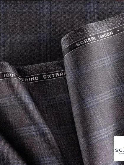 A close-up of a luxurious Super 100s Merino wool from Scabal. This is the quality you can expect when you commission a bespoke piece from me.