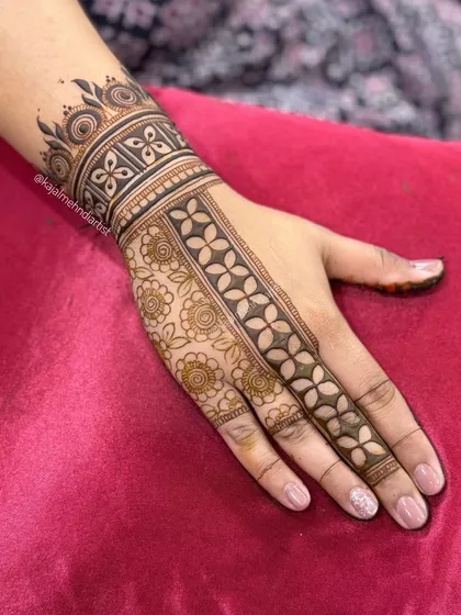 The design partially filled, showing the contrast between line work and filled patterns.