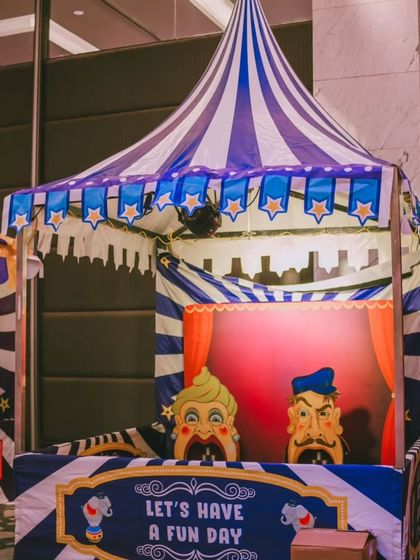 Another fun carnival game booth, inviting guests to 'Have A Fun Day'. These interactive stations are a great way to get guests mingling and add a playful energy to the event.